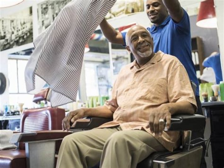 Disabled man in a wheelchair can't get inside a barbershop, but barber's response goes viral
