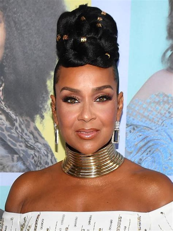 LisaRaye McCoy goes twinning with her adorable granddaughter in floral swimsuits in pics