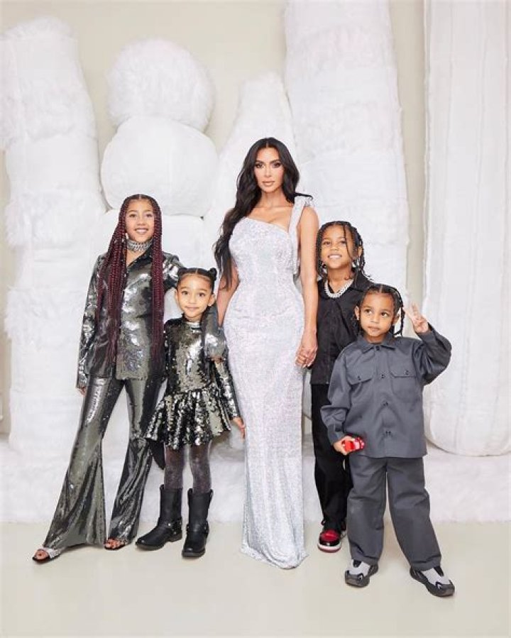 North West Copies Mom Kim Kardashian's Style in a White Dress