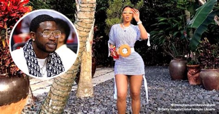 Keyshia Ka'Oir Flaunts Tiny Waist & Long Legs in Striped Mini Dress