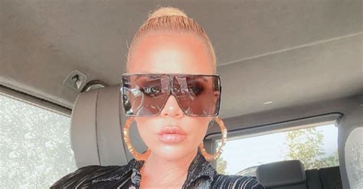 Khloé K of KUWTK Shares Sultry Selfie in Chic Big Sunglasses and Necklace with the Armenian Coat of Arms