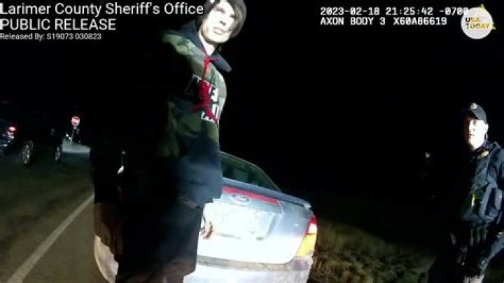 Man Runs into Police Officer Writing Parking Ticket