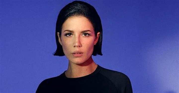 Halsey Flaunts Her Toned Figure in a Sexy Red Snake-Print Bikini in New Photos