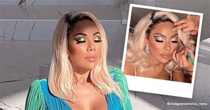 Erica Mena Poses in a Blue Two-Piece & Looks Unforgettable in a Blonde Wig & Cool Makeup 