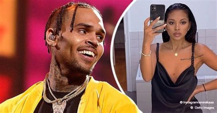 Ammika Harris Poses for Mirror Selfie in Dress with a Deep Neckline, Revealing Her Chest Tattoo