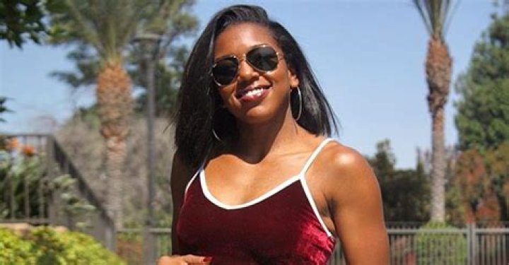 Ashley Monique Clark, Who Played Sydney in 'The Hughleys' Stuns in Plunging Blue Dress (Photo)