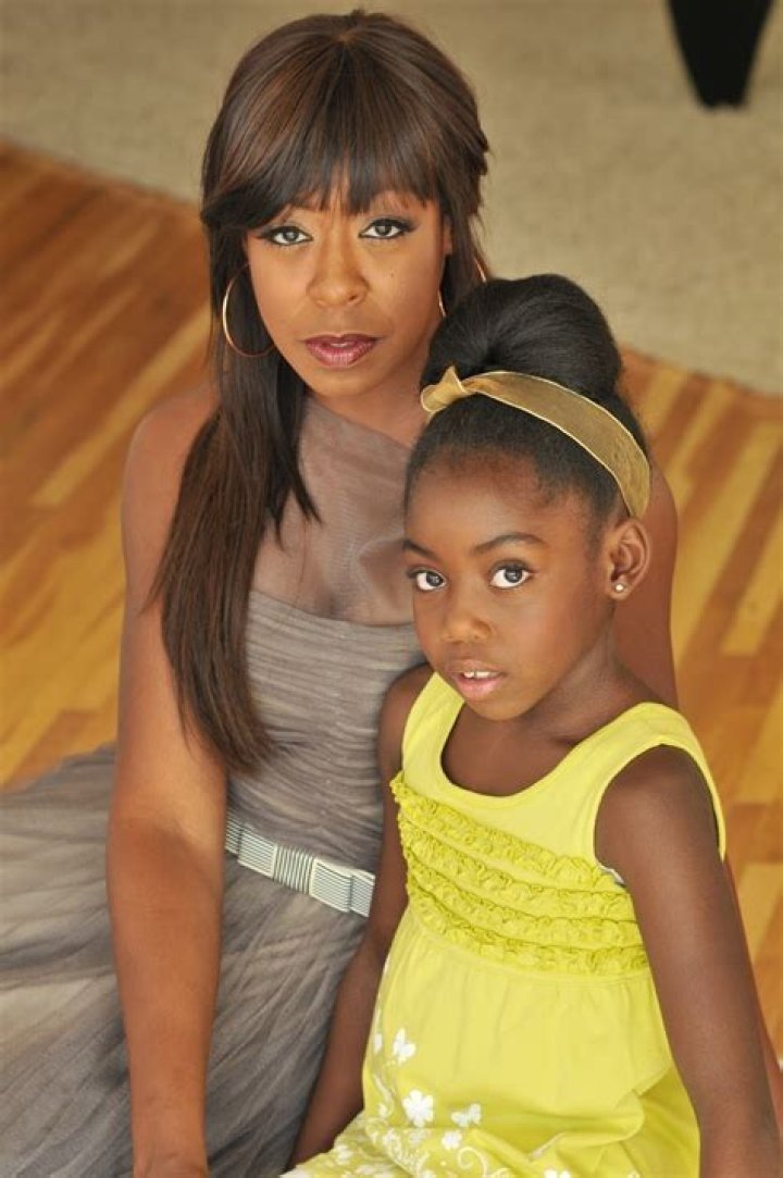 Tichina Arnold's Teenage Daughter Alijah Slays Posing in a Mini-Dress with Fishnet Stockings