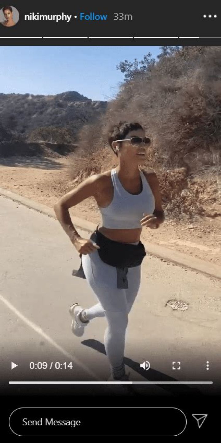 Nicole Murphy Gives Glimpse at Her Fit Body While Running in a White Outfit (Photos)