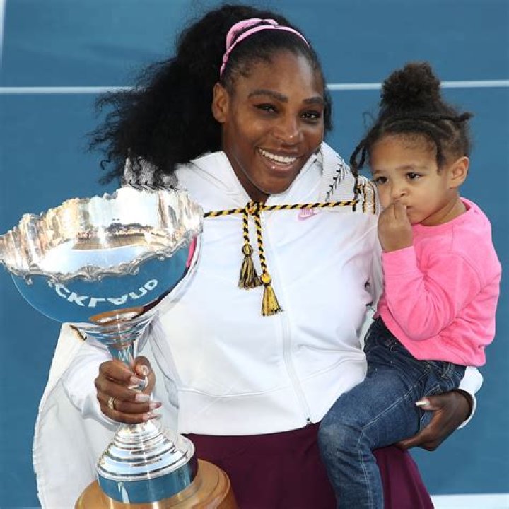 Serena Williams' Daughter Olympia Is a Tennis Princess Holding a Racket in Stunning Red Dress