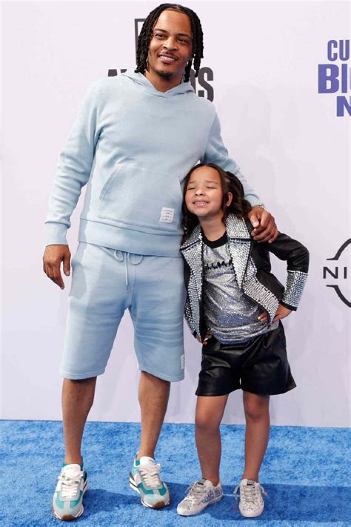 TI & Tiny Harris' Daughter Heiress Poses in a Black & Pink Spider-Girl Costume beside Spider-Man