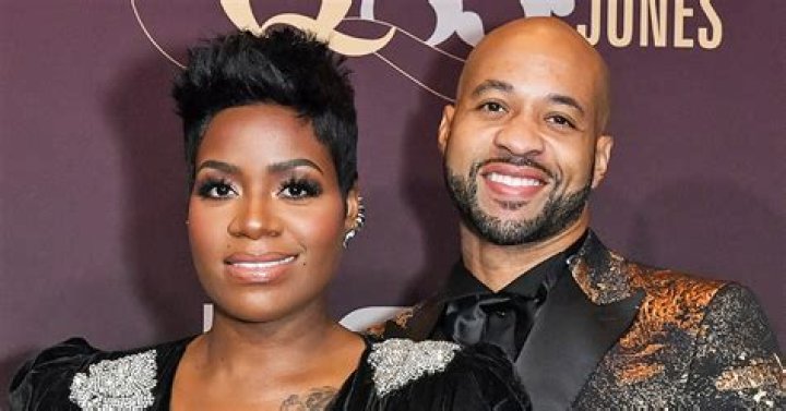 Fantasia Barrino's Husband Cradles Her Growing Baby Bump as She Poses in a Tight White Dress