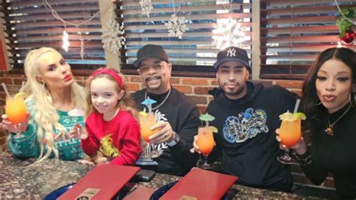 Ice-T's Wife Coco Steps Out with Him in a Street Rocking a Leopard-Print Top & Leather Pants