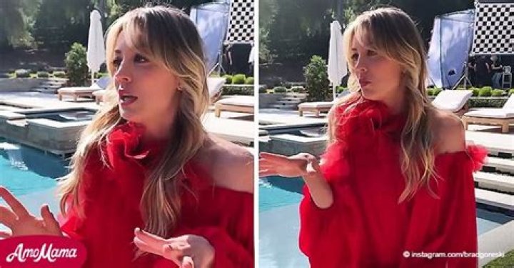 Kaley Cuoco Dazzles Posing near a Swimming Pool in a Glamorous Semi-sheer Red Dress (Video)
