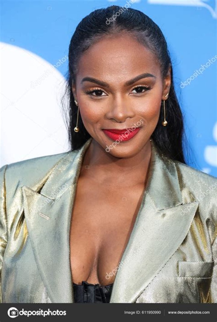 THATHN Actress Tika Sumpter Glows with Happiness as She Poses in an off-Shoulder Floral Outfit