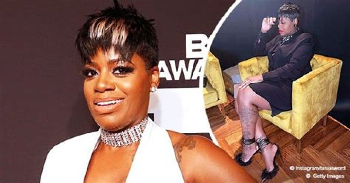 Pregnant Fantasia Stuns Showing Her Cool Tattoos in Black Dress & Heels with Feather Detailing