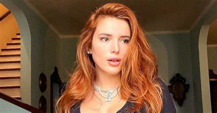Bella Thorne Flaunts Toned Belly and Rocks Cuba Flag Bikini on a Yacht in Throwback Photos