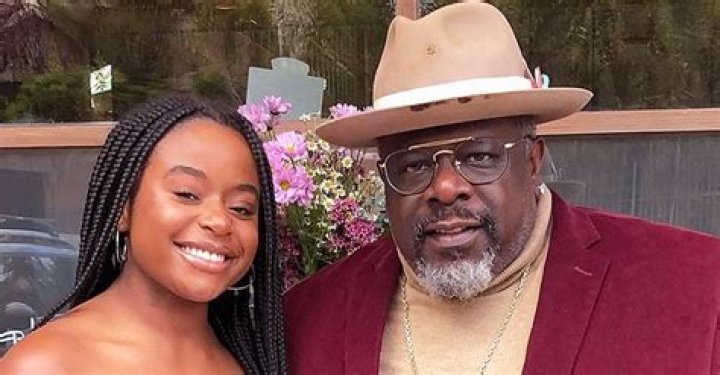 Cedric the Entertainer Poses with His Daughter Lucky in an off-Shoulder Pink Dress