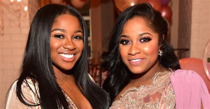 Toya Johnson & Daughter Reginae Look like Twins Rocking Matching Black Dresses in a Photo
