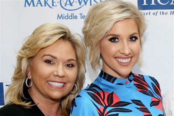 Savannah Chrisley Poses in a White T-Shirt & Blue Skirt with Biracial Niece Chloé in a Cute Pic