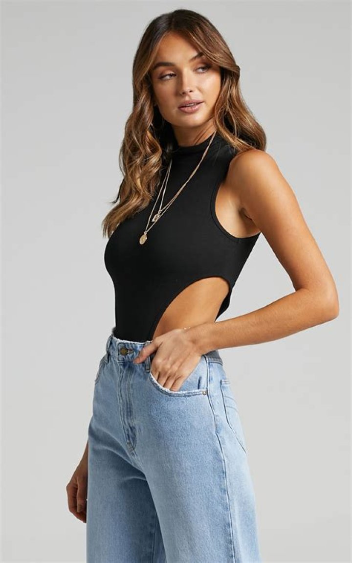 Keke Palmer Dons a Red Cut Out Bodysuit and Shorts in a New Photo of Her Posing like a Boss