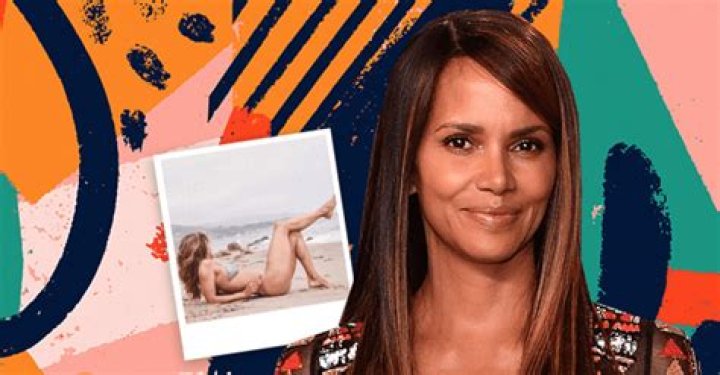 Halle Berry Flaunts Her Thighs Lying on the Wet Sand in a Colorful Swimsuit in New Photo