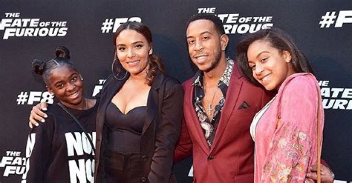 Ludacris’ Oldest Daughter Karma Snatches Hearts in Skimpy Tube Top & Stylish Beige Skirt near Wall