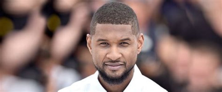 Fans & Celebs Slam Usher for Scaring His Look-Alike Baby Daughter in New Video: ‘That’s Not Funny'