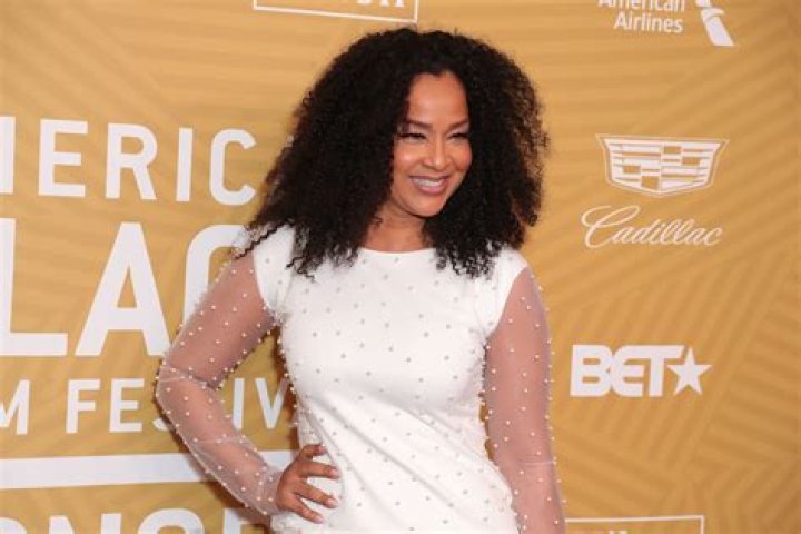 LisaRaye McCoy Stops Fans’ Hearts in a Skimpy Cream Tone Two-Piece Showcasing Killer Figure on Her 54th B-Day