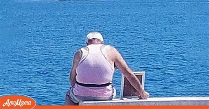 Elderly Man Sits on the Beach Hugging a Framed Photo and Cries — Stranger Approaches to Hear His Story