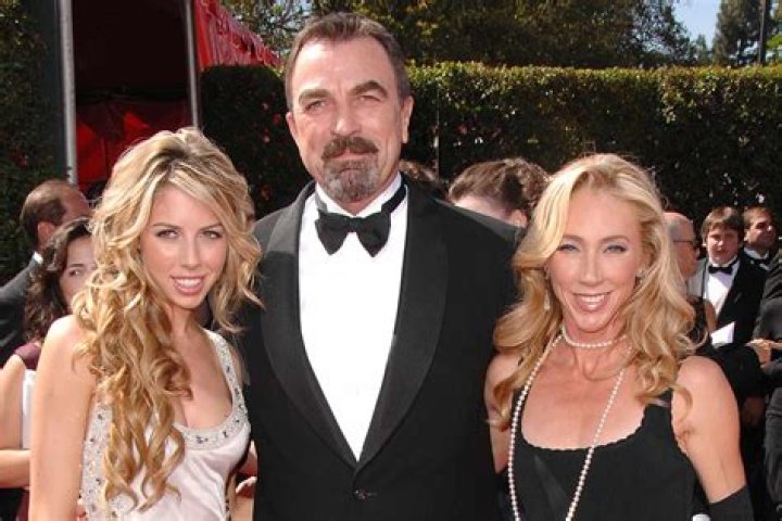 Tom Selleck's Daughter Hannah Selleck Shows Her Slim Body in a Black Mini Dress with Slits
