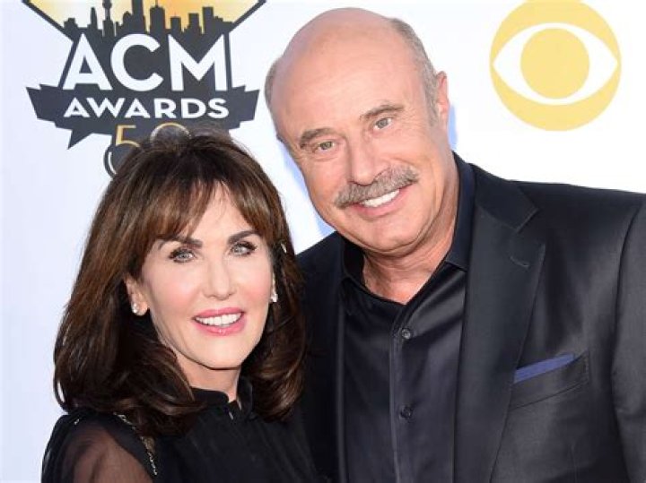 Robin McGraw Shares Pic with Husband Phil McGraw & Fans Notice Lipstick on Her Teeth
