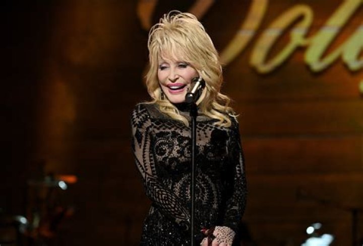 Dolly Parton Flaunts Slender Legs at 77 in Skimpy Snake-Print Dress Promoting Her New Single