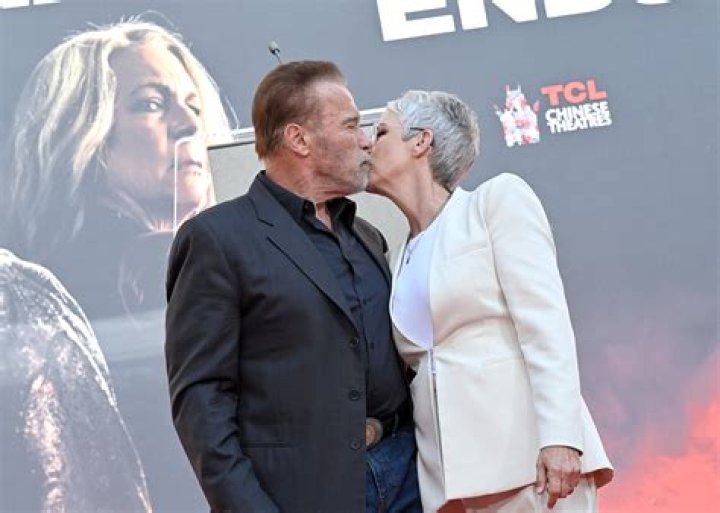 ‘Wowww’: Jamie Lee Curtis, 64, Poses in Red Dirndl Dress & Flower Crown Alongside Arnold Schwarzenegger