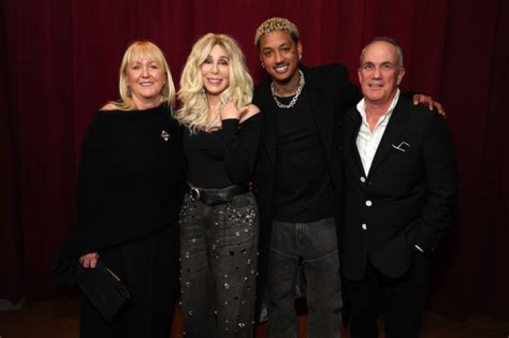 Cher, 77, Cuddles with Much Younger Boyfriend, 38, in Rare Public Appearance — Photo