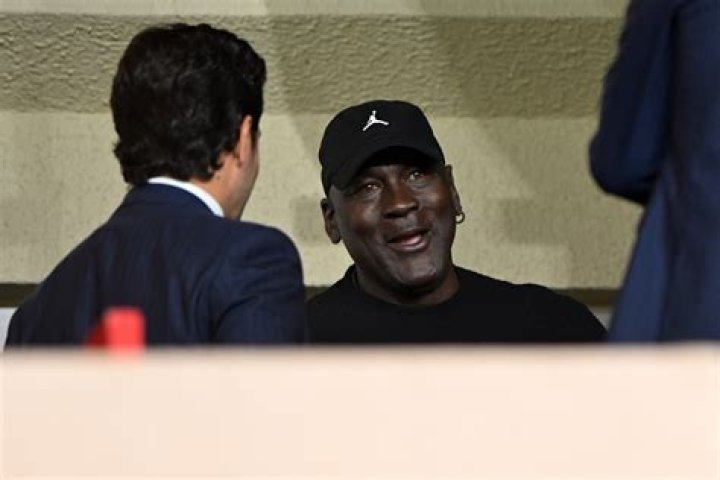 Michael Jordan causes concern after stepping out with half empty liquor bottle in hand
