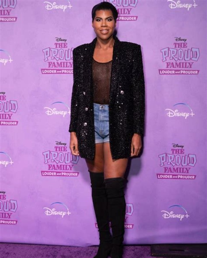 Magic Johnson's son E. J. stuns in tiny shorts with glittery tights and sleeveless shirt