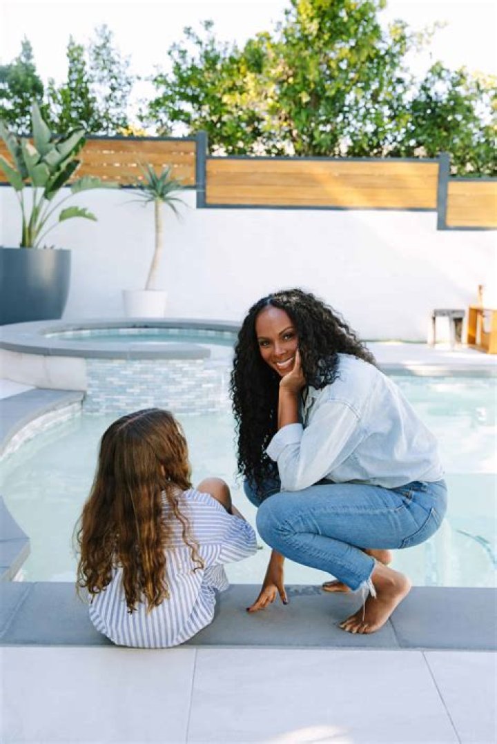 Tika Sumpter shares photo of her mother in white lace dress showing off their uncanny resemblance