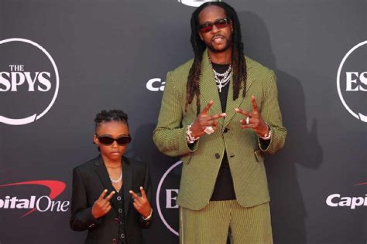 Rapper 2 Chainz enjoys daddy duties playing basketball with 2 of his kids