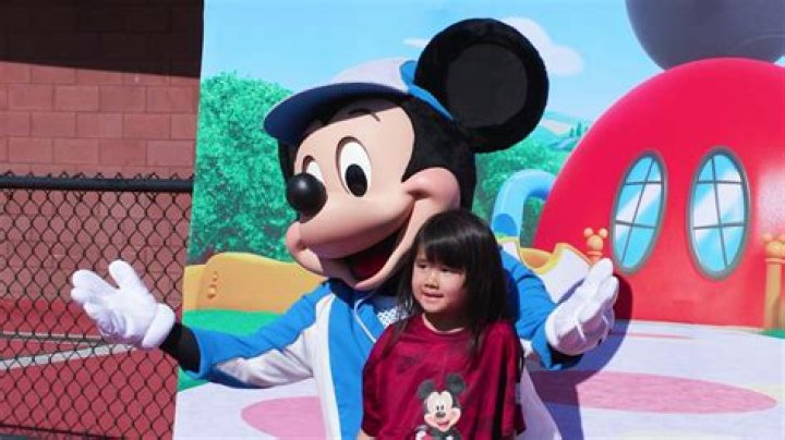 Mickey Mouse surprises two kids with emotional adoption announcement